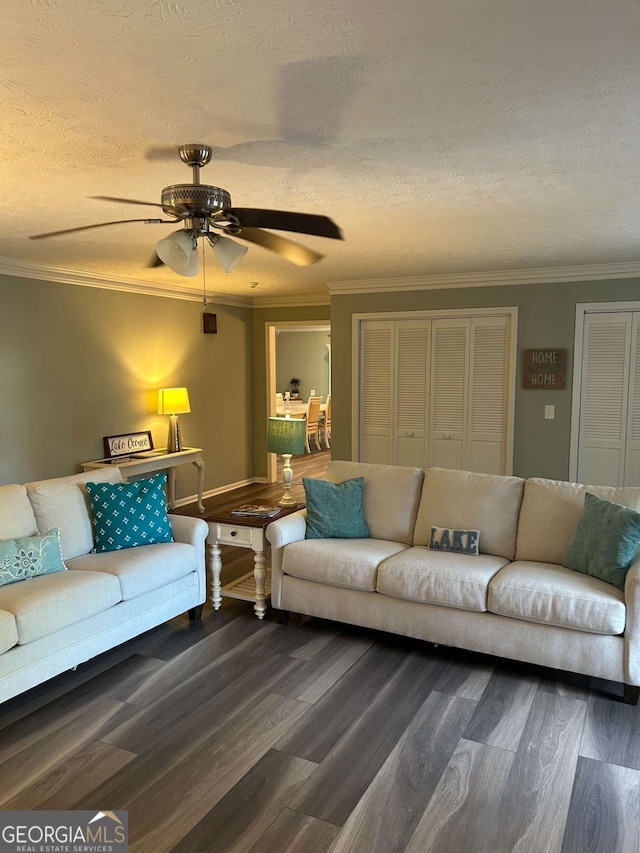 living room featuring hardwood / wood-style floors, a textured ceiling, ceiling fan, and crown molding