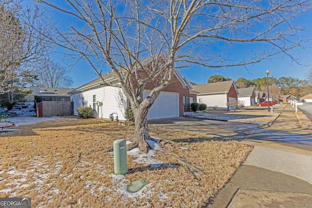 single story home with a garage