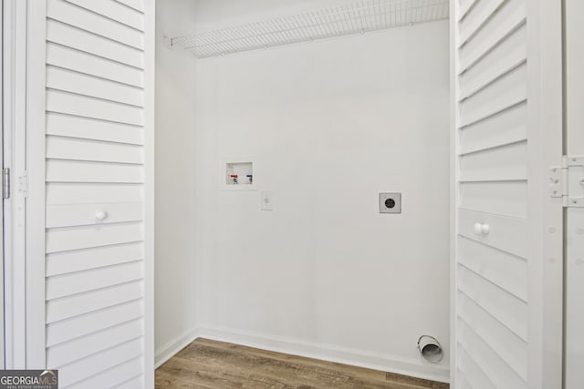 laundry room featuring washer hookup, wood-type flooring, and electric dryer hookup