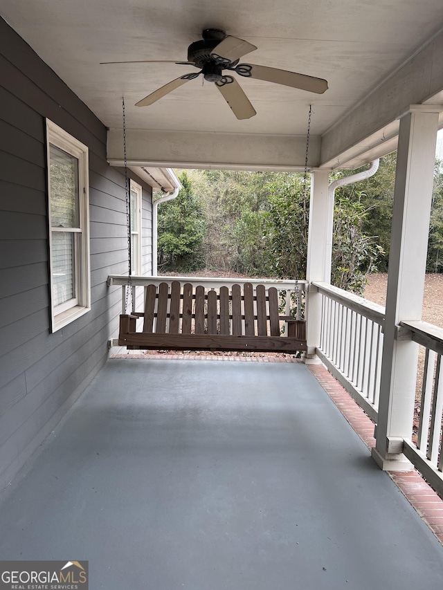 view of patio featuring covered porch and ceiling fan