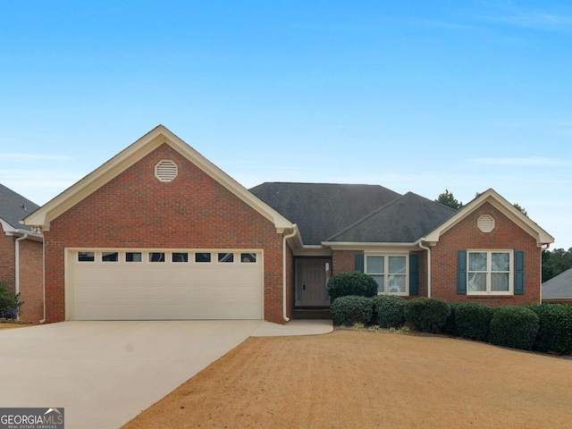 ranch-style home with a garage