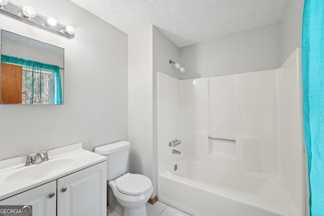 full bathroom with toilet, tile patterned floors, a textured ceiling, tub / shower combination, and vanity