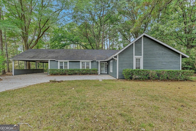 ranch-style house with a front yard and a carport