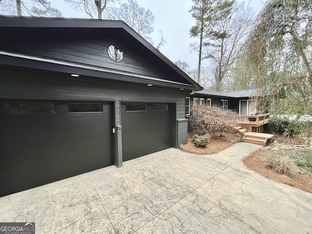 view of property exterior featuring a garage