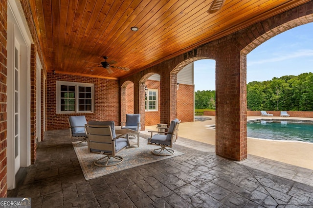 view of patio with ceiling fan