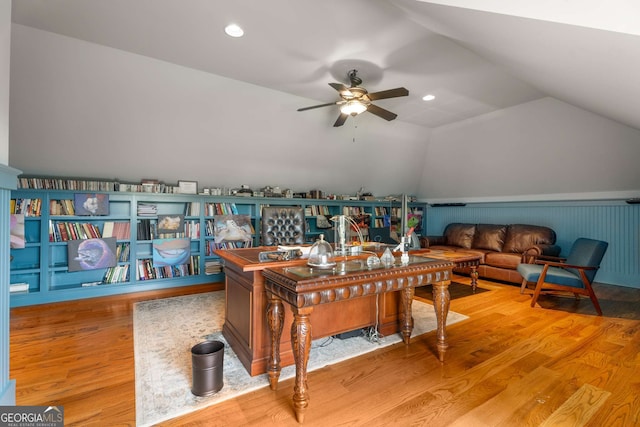 office with wood-type flooring, ceiling fan, and lofted ceiling