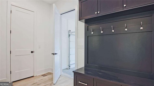 mudroom featuring light wood-type flooring