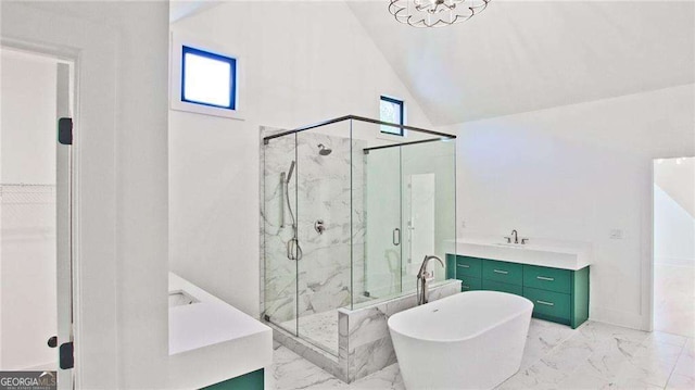 bathroom with a notable chandelier, vaulted ceiling, plus walk in shower, and vanity