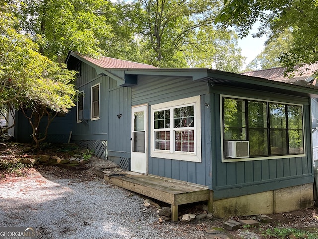 view of outbuilding featuring cooling unit