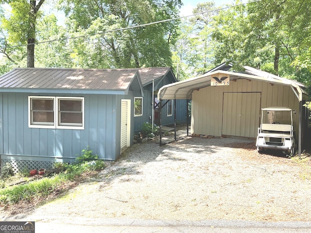 view of outdoor structure with a carport