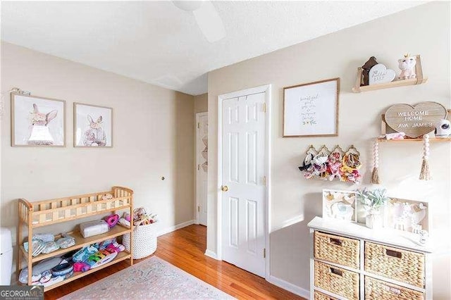 game room featuring hardwood / wood-style floors