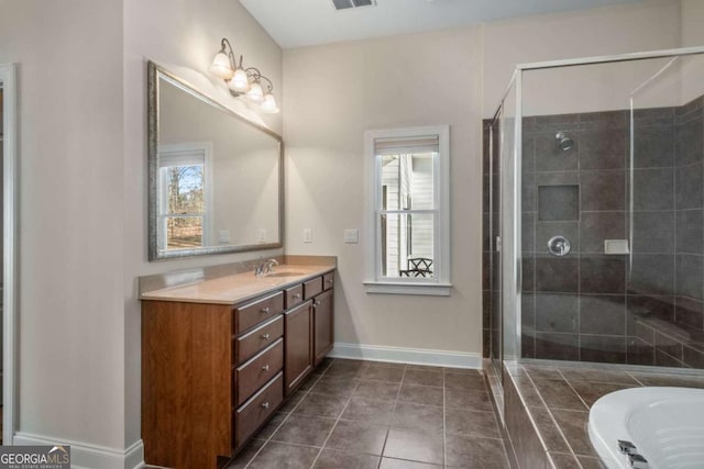 bathroom featuring separate shower and tub, tile patterned floors, and vanity