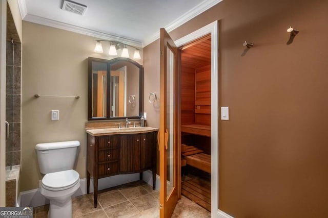 bathroom featuring toilet, tile patterned flooring, ornamental molding, and vanity