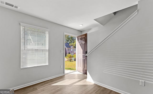 foyer with light wood-type flooring