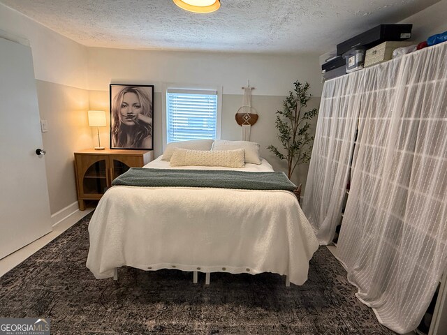 bedroom with a textured ceiling