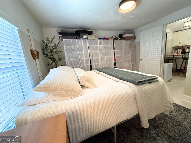 bathroom featuring toilet, vanity, and curtained shower