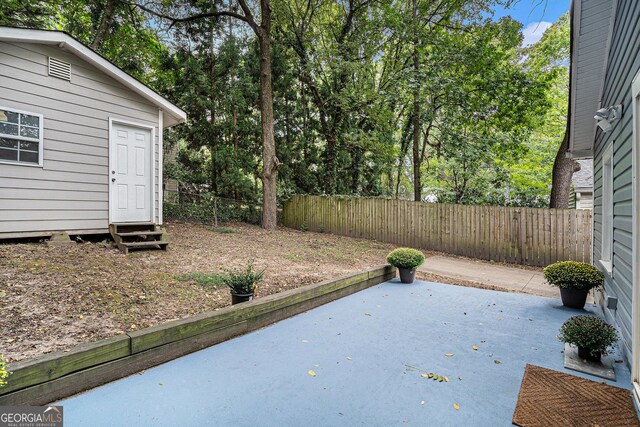 back of property featuring a patio area