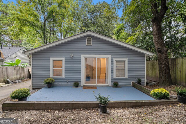 rear view of house featuring a patio area