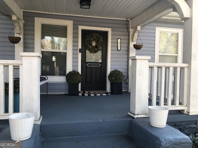 entrance to property with covered porch