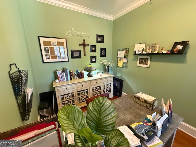 office area with ornamental molding and hardwood / wood-style flooring