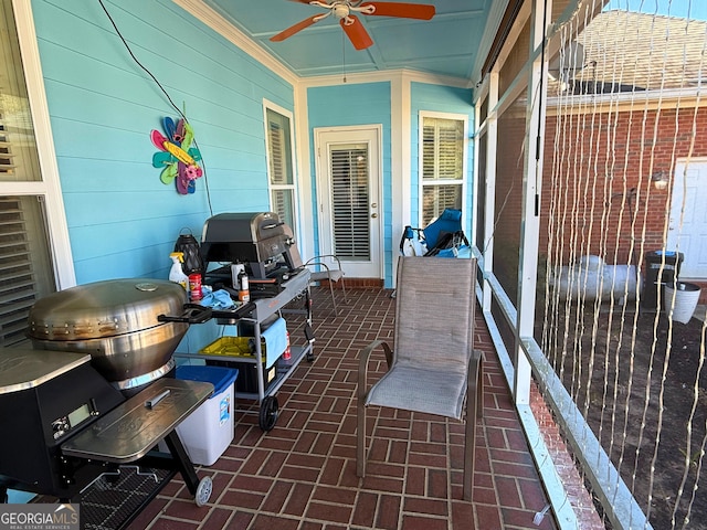 view of patio with ceiling fan