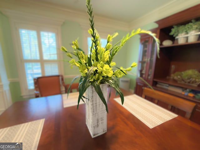 dining room with crown molding