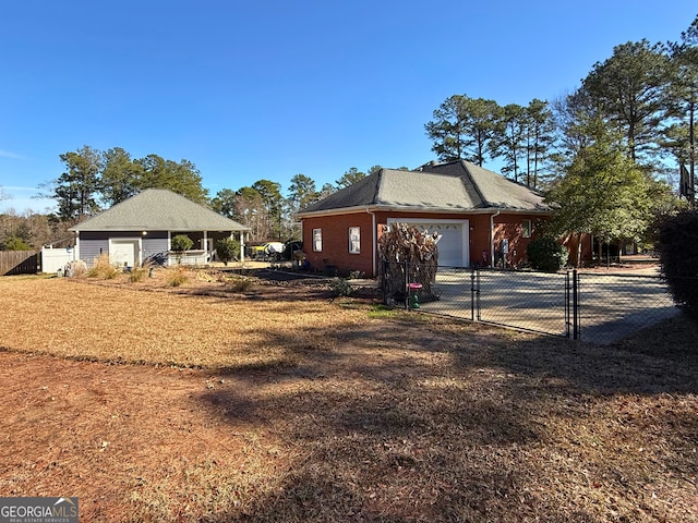 view of side of property featuring a garage