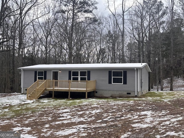 manufactured / mobile home with crawl space and a deck