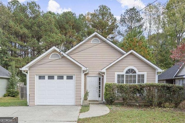 view of front of property featuring a garage