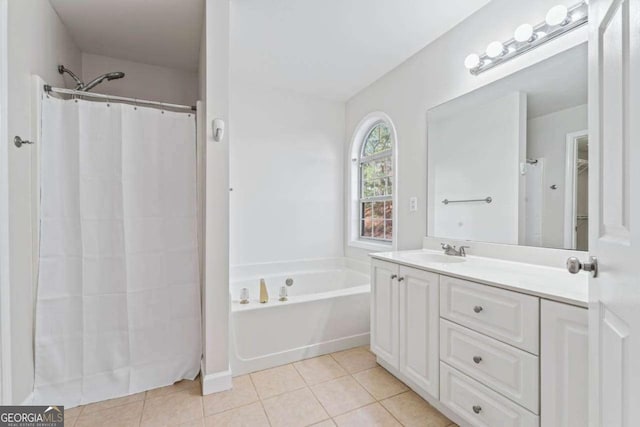 bathroom featuring separate shower and tub, tile patterned flooring, and vanity