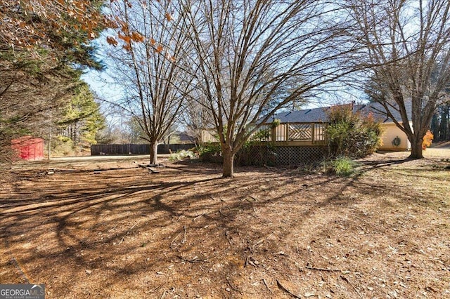 view of yard featuring a deck