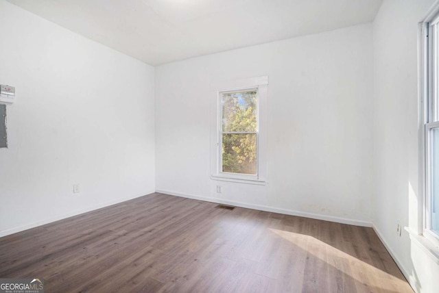 spare room featuring hardwood / wood-style floors