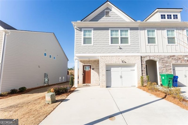 multi unit property featuring a garage