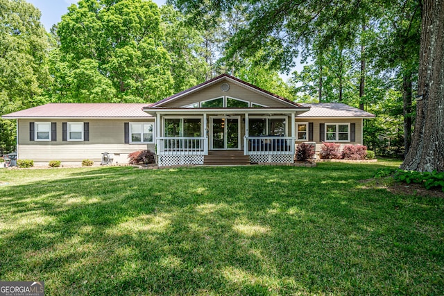 ranch-style house with a front yard