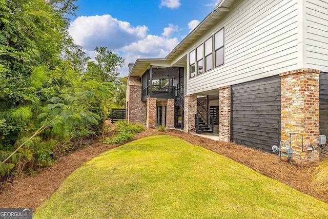 view of yard featuring stairs