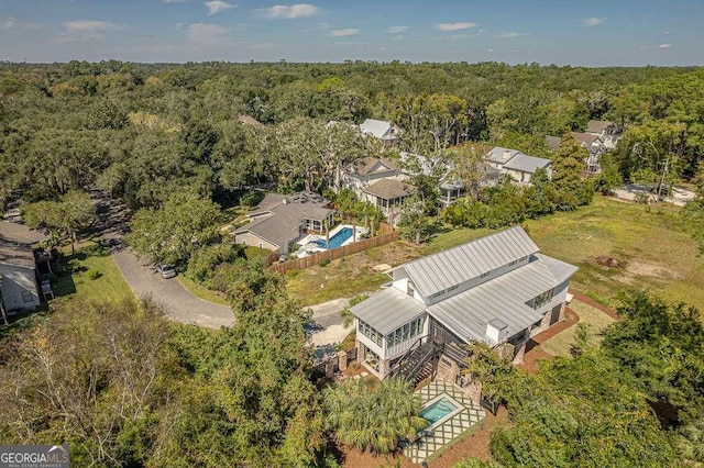 bird's eye view featuring a view of trees