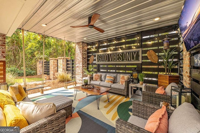 view of patio / terrace with outdoor lounge area and a ceiling fan