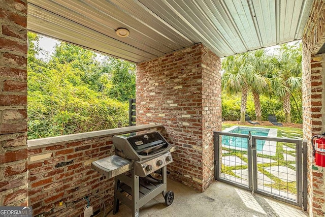 view of patio / terrace with a grill