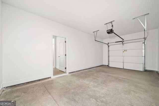 garage featuring a garage door opener