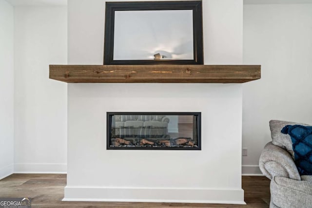 interior details featuring hardwood / wood-style floors