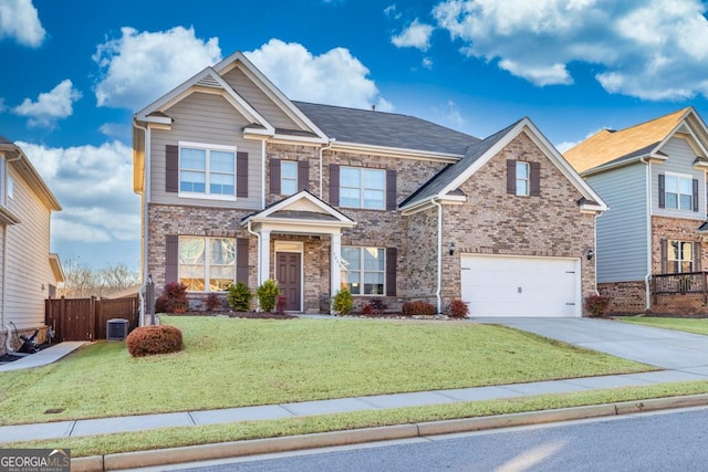 craftsman-style house with central AC, a front lawn, and a garage