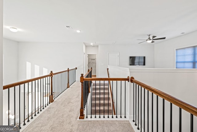 corridor featuring carpet flooring