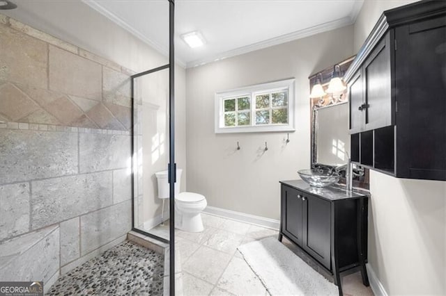 bathroom featuring toilet, crown molding, walk in shower, and vanity