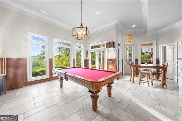 game room featuring pool table, crown molding, and plenty of natural light