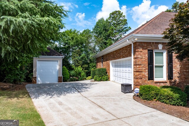 view of property exterior with a garage