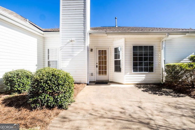 doorway to property with a patio