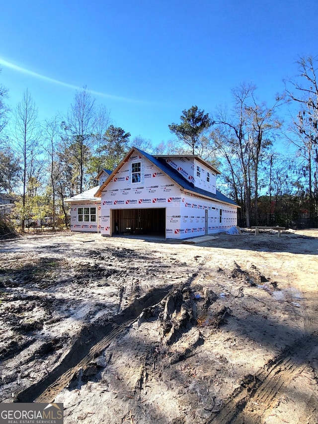 view of home's exterior with a garage