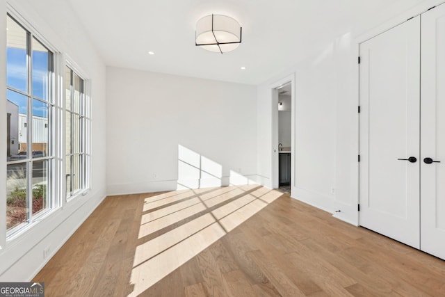 hallway featuring light wood-type flooring