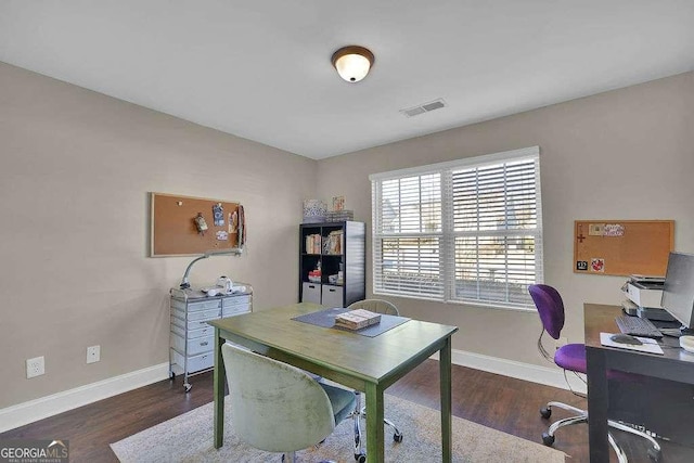 office space featuring dark wood-type flooring