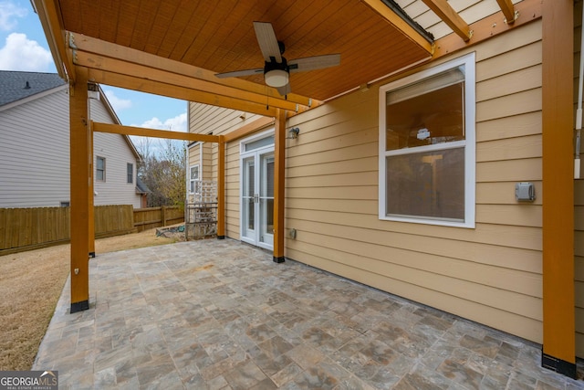 view of patio featuring ceiling fan